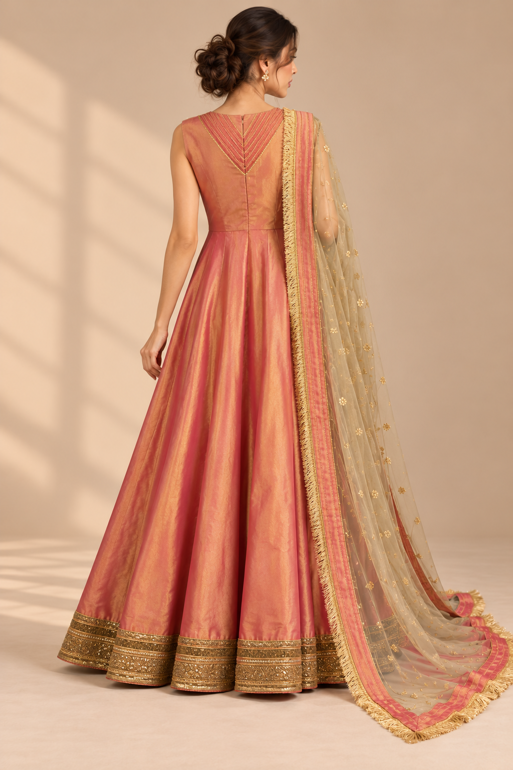Rose Aurum rose-pink gold floor-length dress back view with sheer gold embroidered scarf