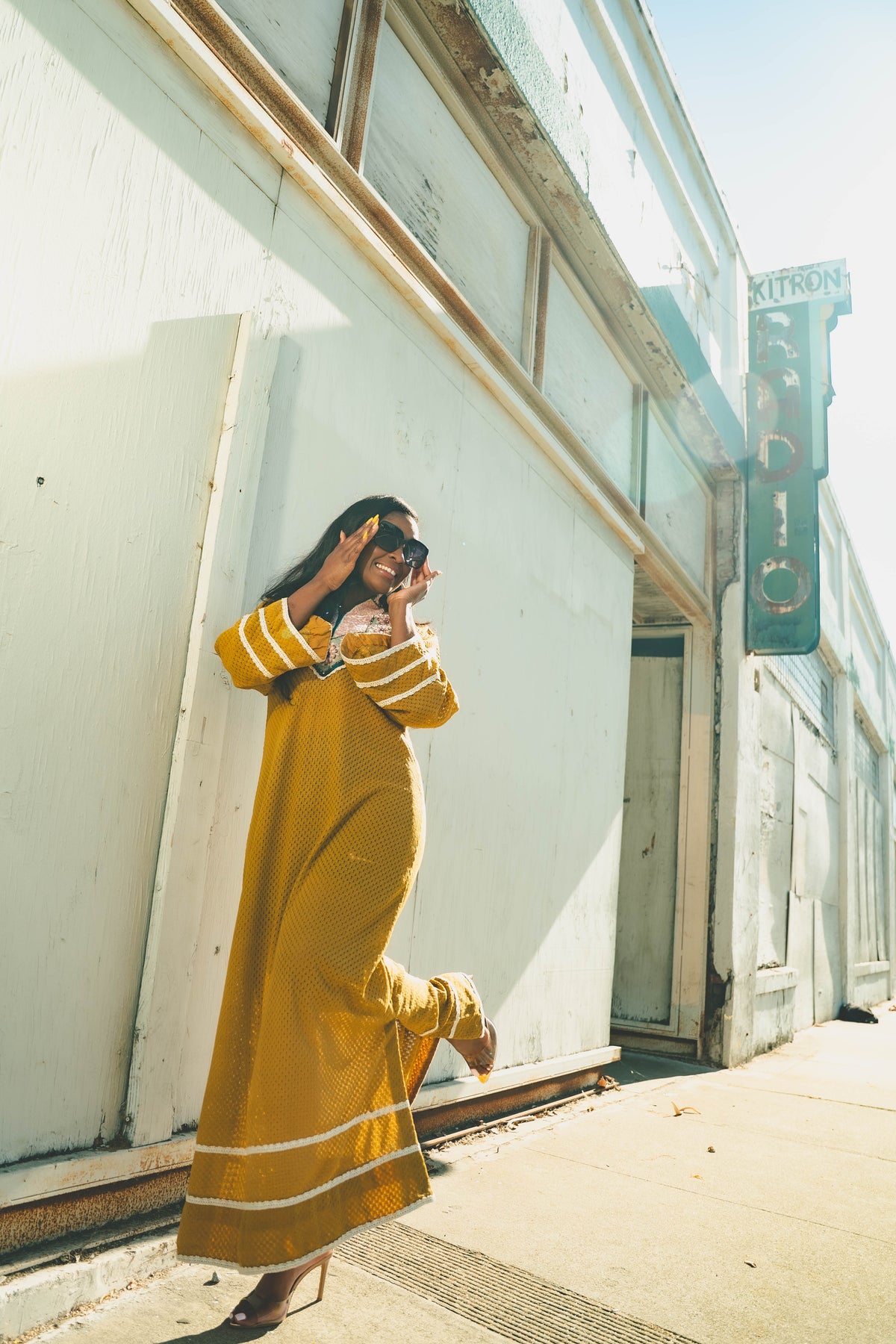 House of MEHDI campaign — mustard dress at Kitron