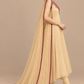 Floral Serenade side view with flowing ivory dress and fuchsia edged scarf